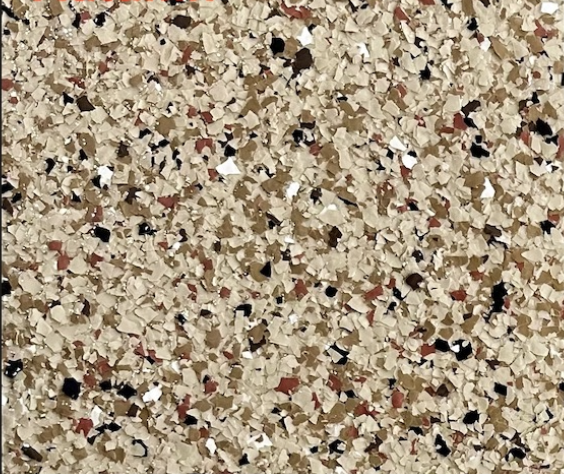Autumn epoxy flake floor color sample with tan, cream, brown, black, and rust-colored flakes.